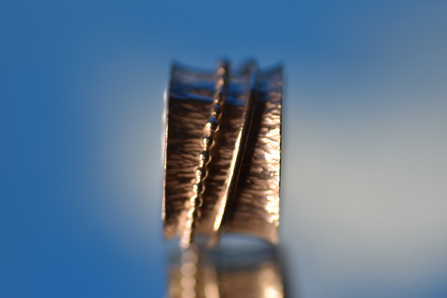 Close-up of a spinning ring on a blurred background